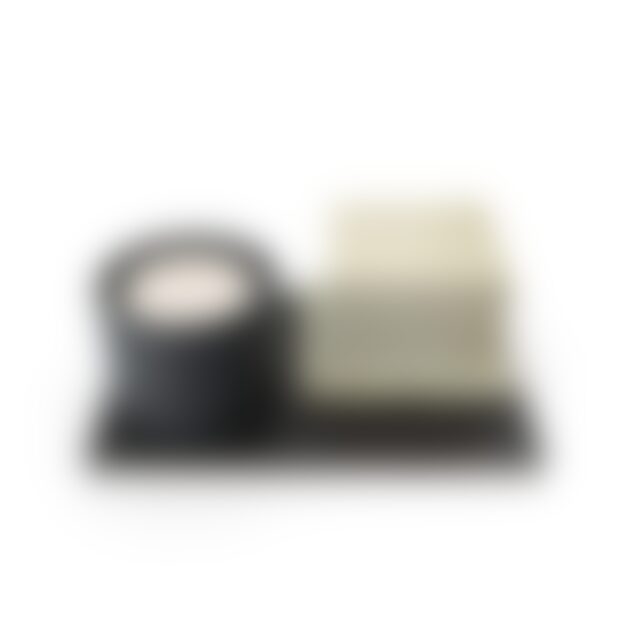 Candle and Small Box on Notebook